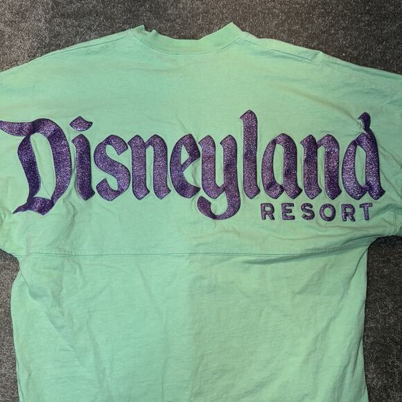 Disney Parks Spirit Jersey Walt Disney Land Resort Ariel Shell Green Adult SZ XS - Picture 10 of 11